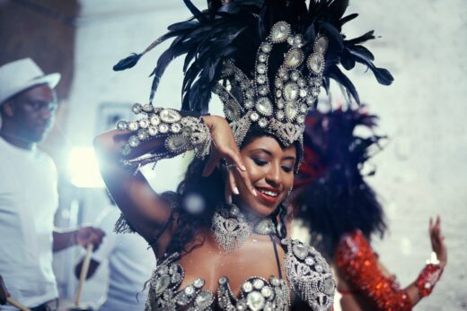 Shot Of A Beautiful Samba Dancer Performing In A Carnival With Her Band